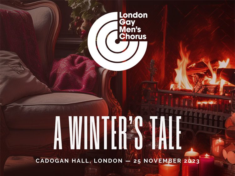 A cosy armchair in front of a roaring fire in a hearth