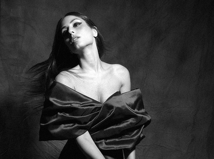 Black and white portrait photo of Hiba Tawaji