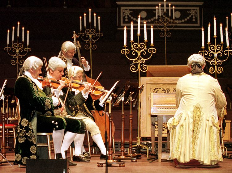 Members of the Mozart Festival Orchestra performing in period costume