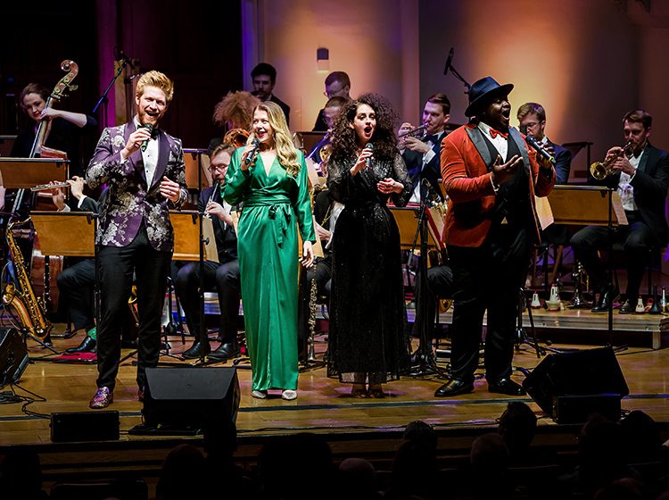 Vocalists on stage with the Down for the Count Swing Orchestra