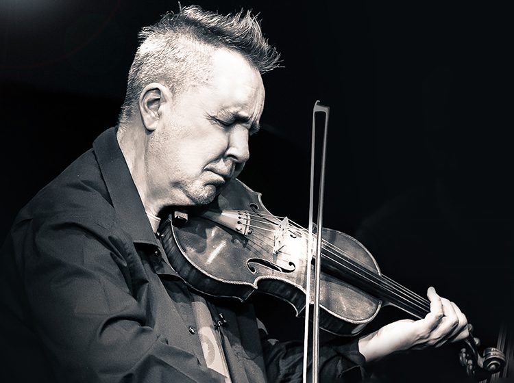 Nigel Kennedy playing the violin. Photo by Carly Hyde.