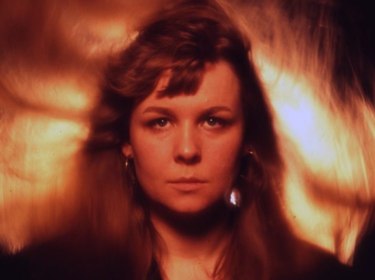 Sandy Denny with firey background