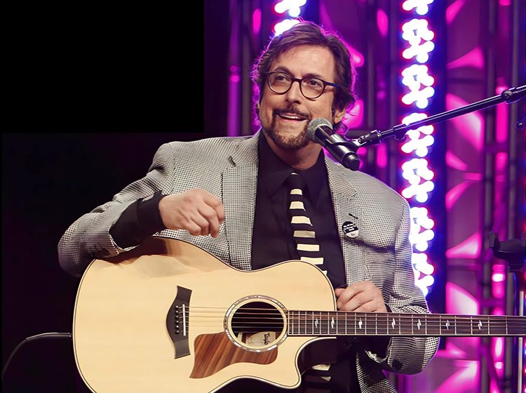 Stephen Bishop with his guitar